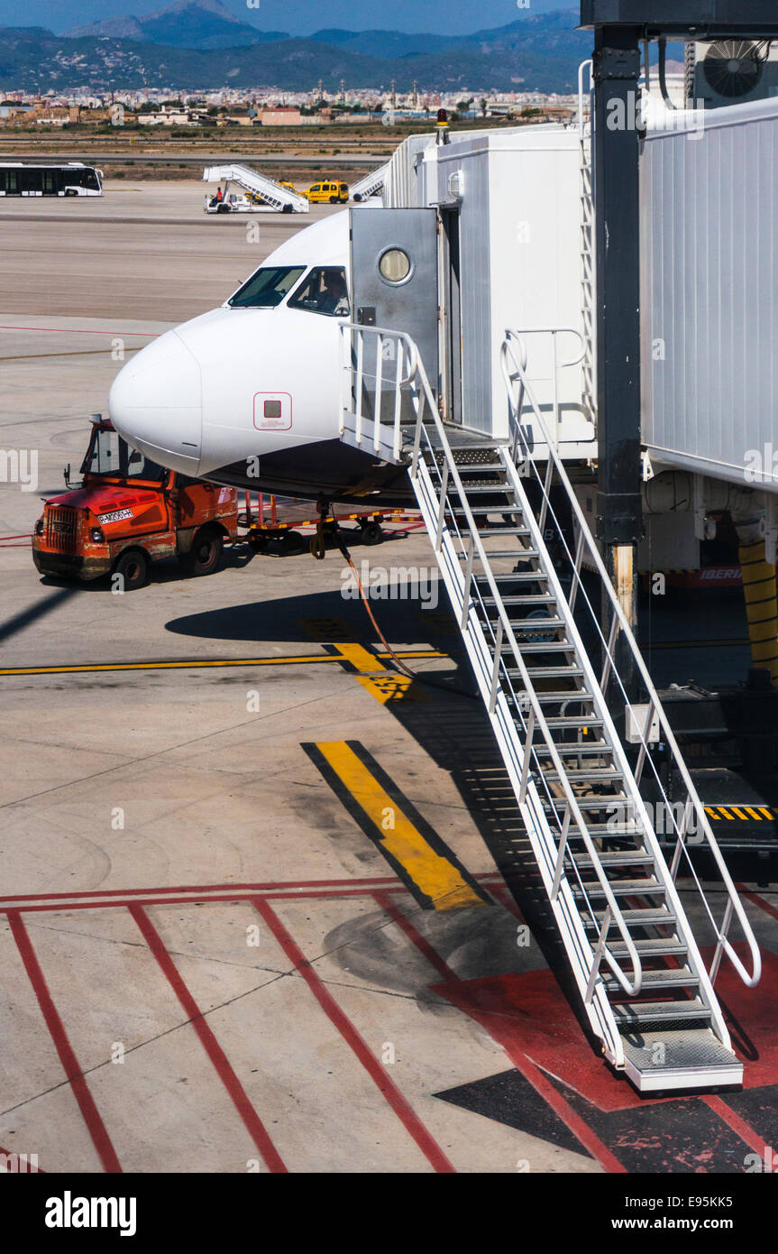 Steps leading up to the aerial gangway docked to a Monarch Airbus A321 aeroplane Stock Photo