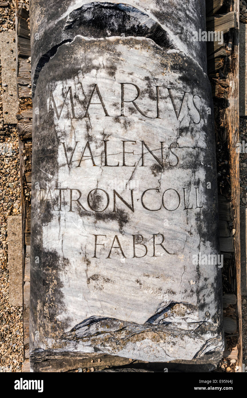 Inscription on column at Forum in Ulpia Traiana, Roman Dacia ruins in village of Sarmizegetusa, Transylvania, Romania Stock Photo