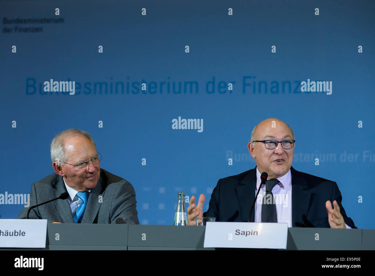 Berlin, Germany. 20th Oct, 2014. French Minister of Finance Sapin, French minister of economics Macron, German Minister of economics Gabriel and German and German Minister of Finance Schäuble in a join press conference about co-operation in the economic policy, financial policy and investments realized at  German Ministry of Finance on October 20th, 2014 in Berlin, Germany. / Picture: Wolfgang Schäuble (CDU), German Minister of Finance, and Michel Sapin, French Minister of the  Finance. Credit:  Reynaldo Chaib Paganelli/Alamy Live News Stock Photo