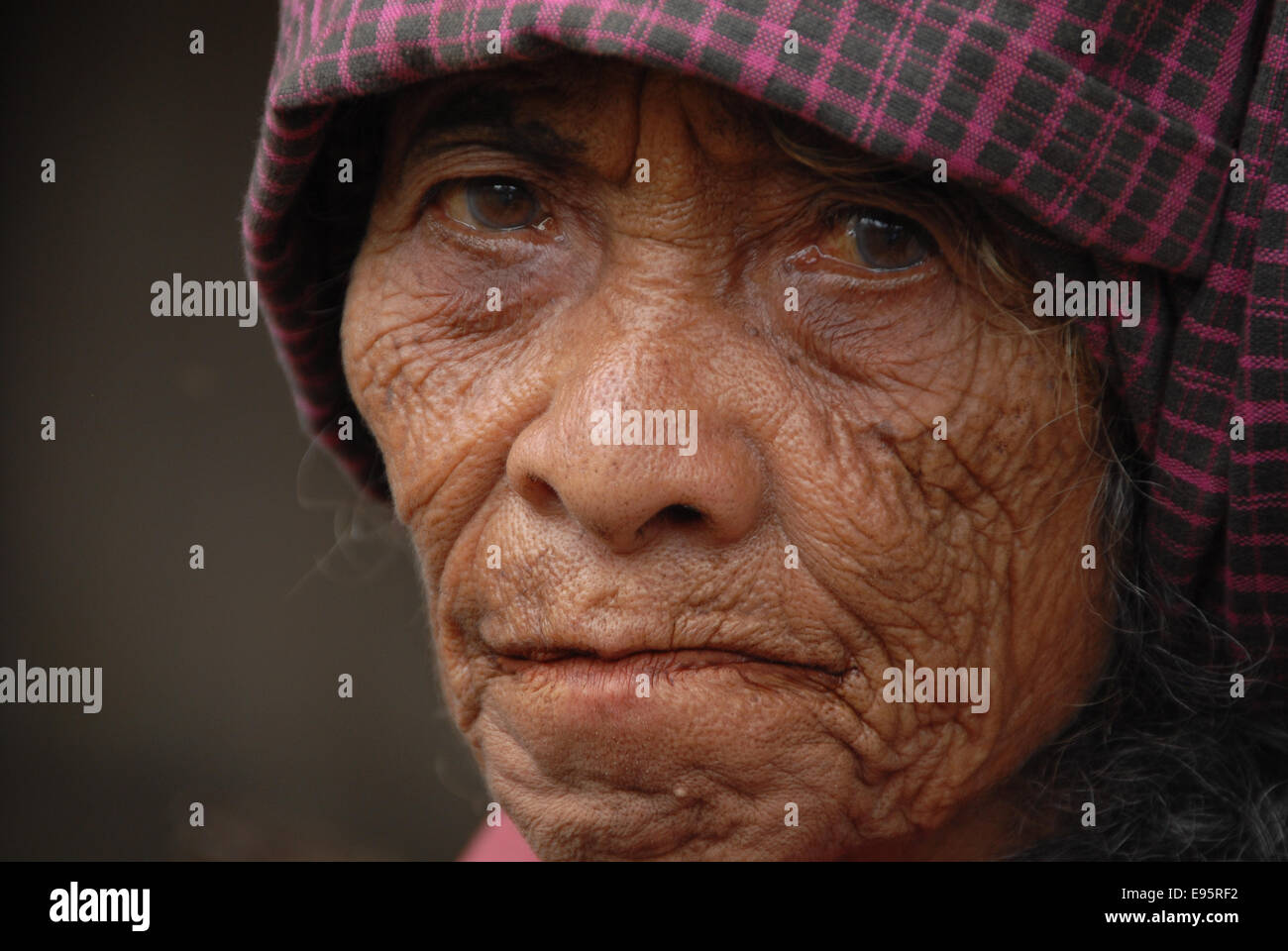 portrait of old woman with wrinkles in flores indonesia Stock Photo