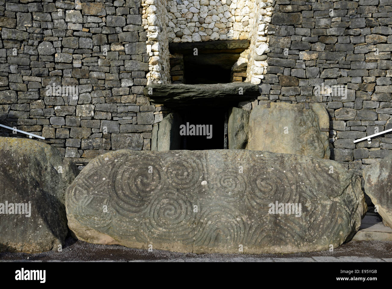 Newgrange megalithic passage tomb entrance stone doorway light box meath ireland world heritage site archaeological Stock Photo