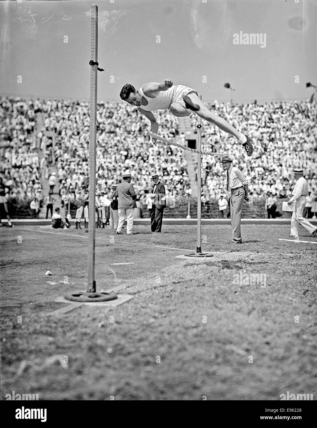 [Athlete knocking down the high jump bar at the 1936 Randall's Island