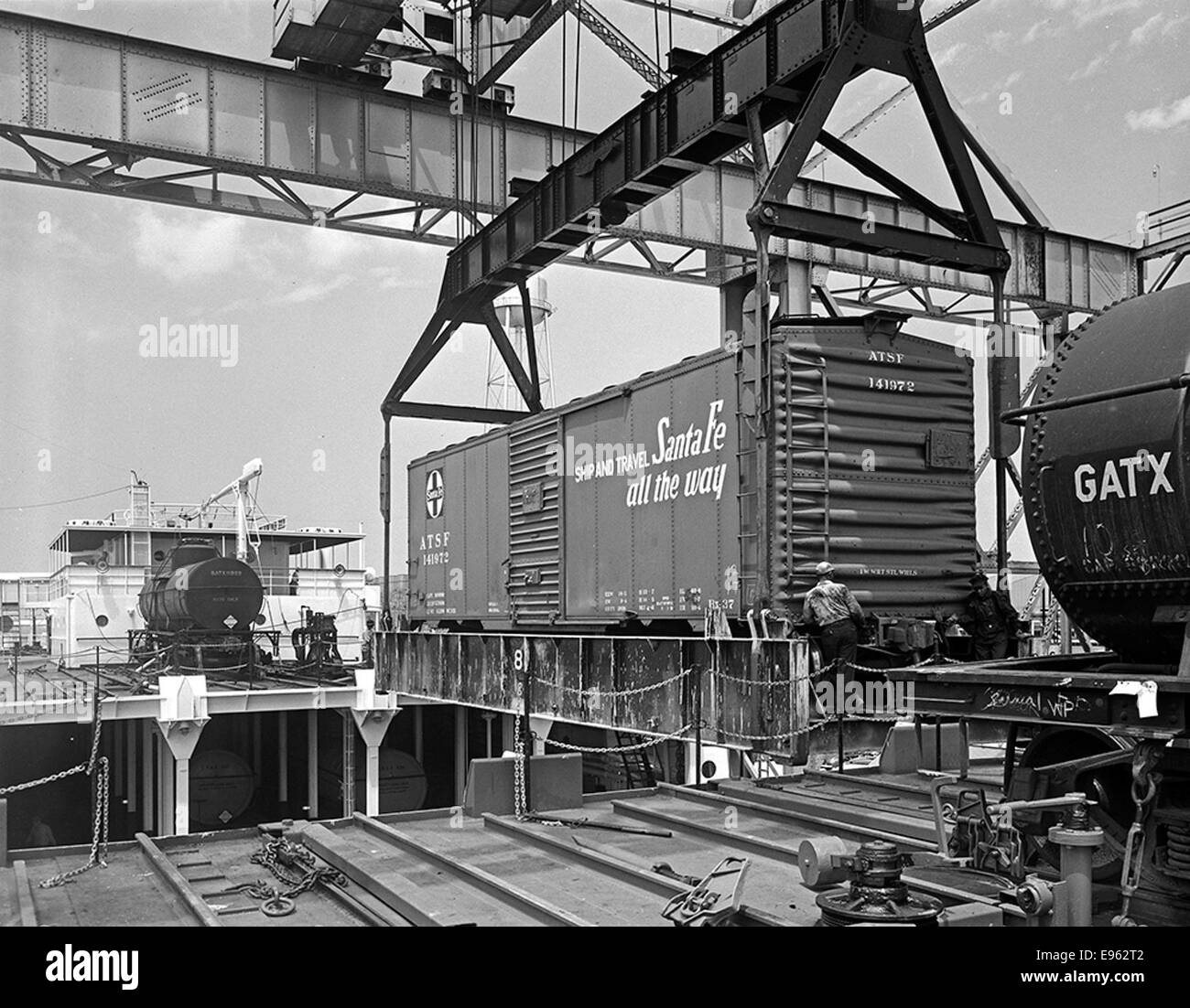 [Seatrain Louisiana, Hoisting ATSF Railroad Freight Car from Cargo Hold, Seatrain Lines] Stock Photo