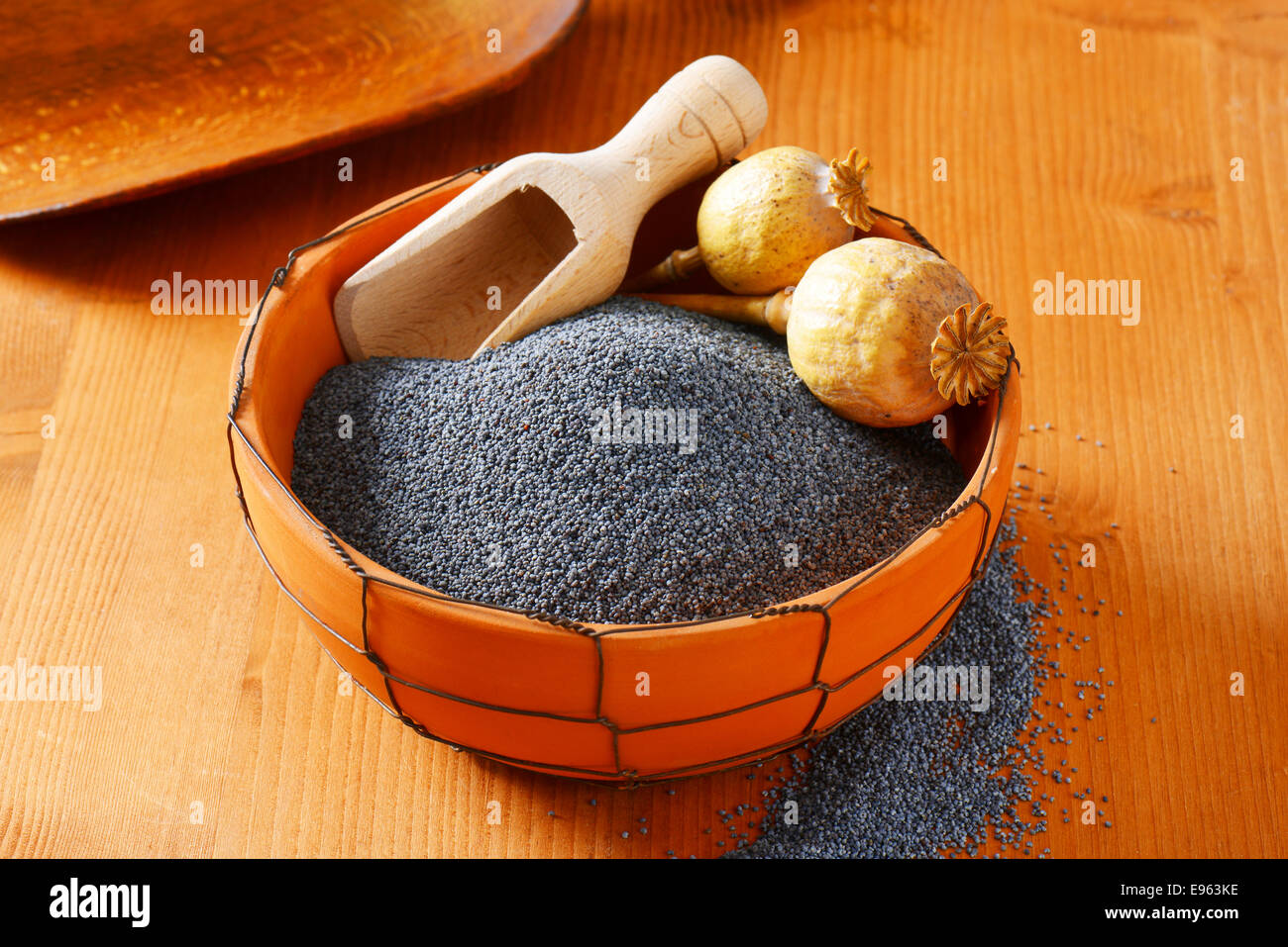 Bowl of whole poppy seeds Stock Photo Alamy