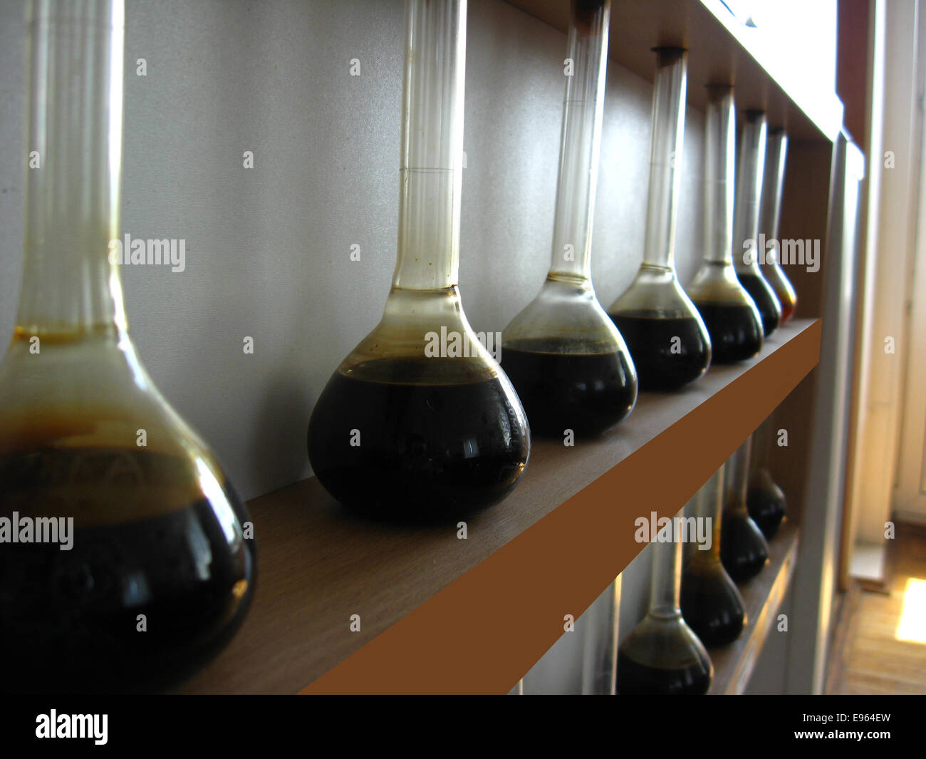 image with samples of oil in the flasks Stock Photo
