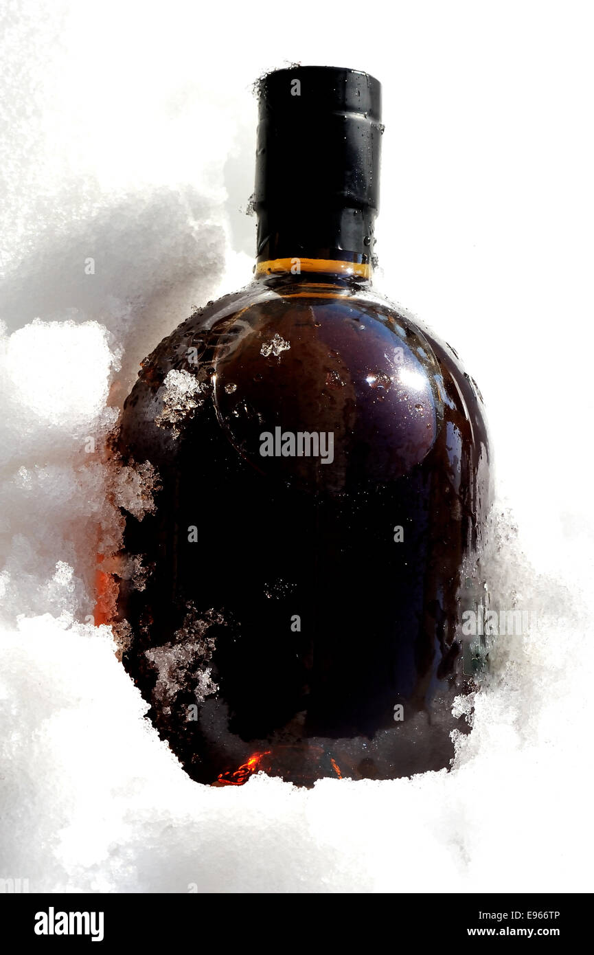 A Bottle in Snow Stock Photo