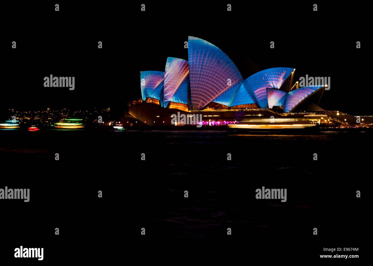 Sydney Opera House lit up with colourful lights during Vivid Night Festival Stock Photo