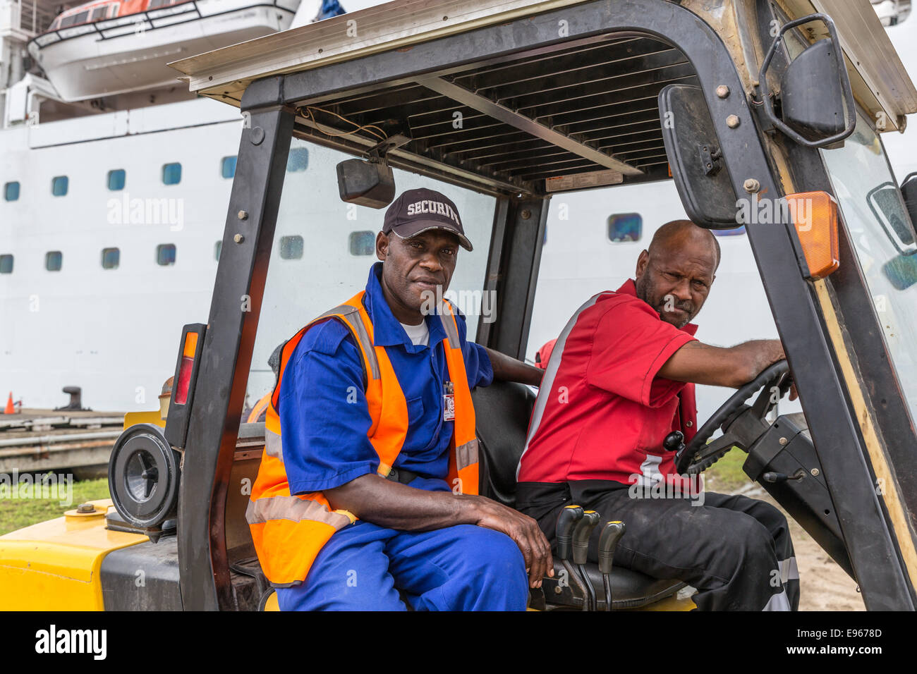 Machinery operators prepare to assist with repairs to cruise ship in Espiritu Santo, Vanuatu. Stock Photo
