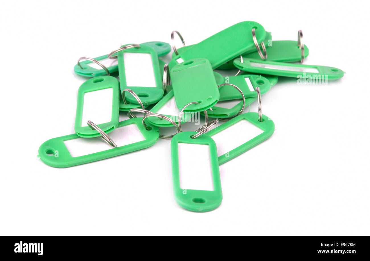 collection of greenl key fobs on a white background Stock Photo - Alamy