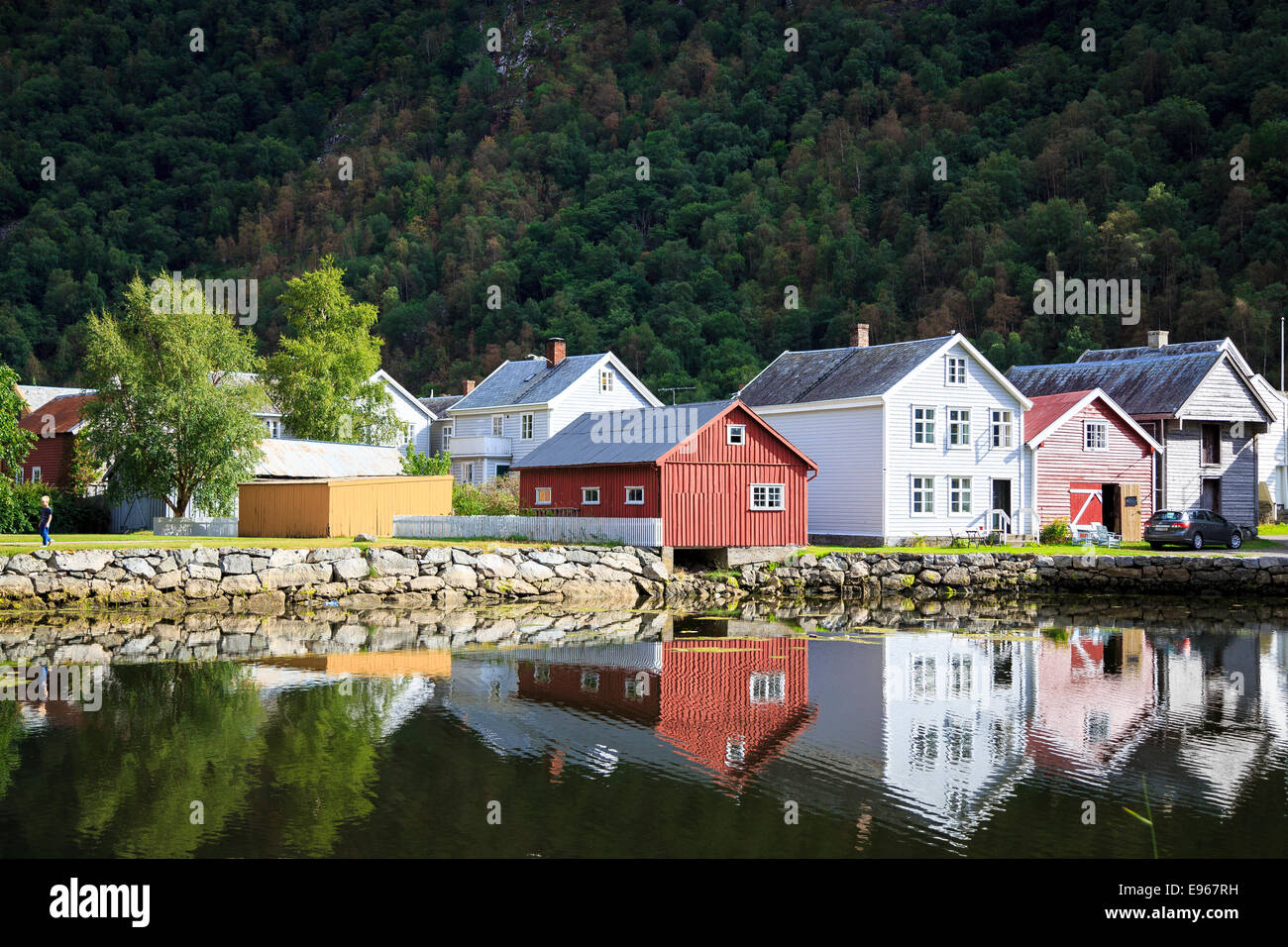 Traditional timber houses reflected in water in Laerdal, Sogn og Fjordane, Norway Stock Photo