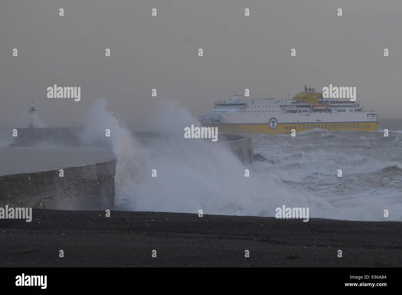Newhaven, East Sussex, UK. 21 October 2014. Ferry arrives at Newhaven West Arm as remnants of Hurricane Gonzalo whips up the sea off the South Coast. David Burr/Alamy Live News Stock Photo