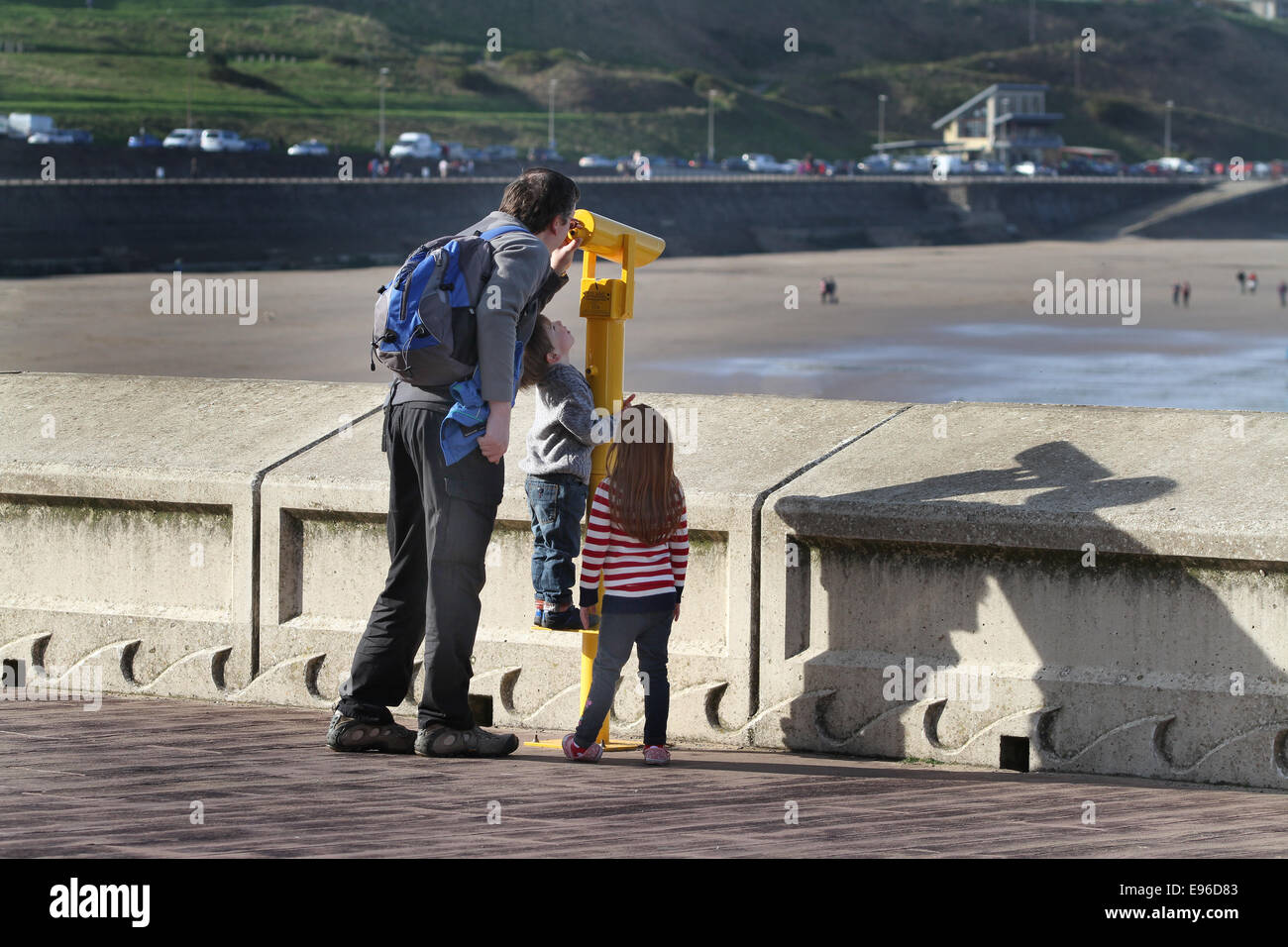 Man with children and telescope. Stock Photo