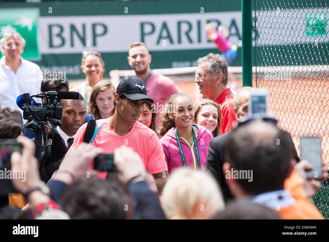 Rafa Nadal,cap, surrounded by fans after he practiced on outside court,Roland Garros,French Open tennis tournament,Paris,France Stock Photo