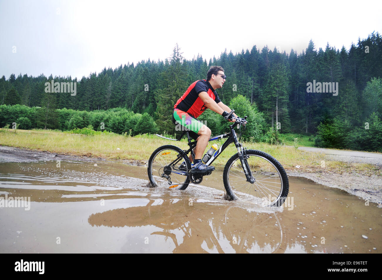 wet mount bike ride Stock Photo Alamy