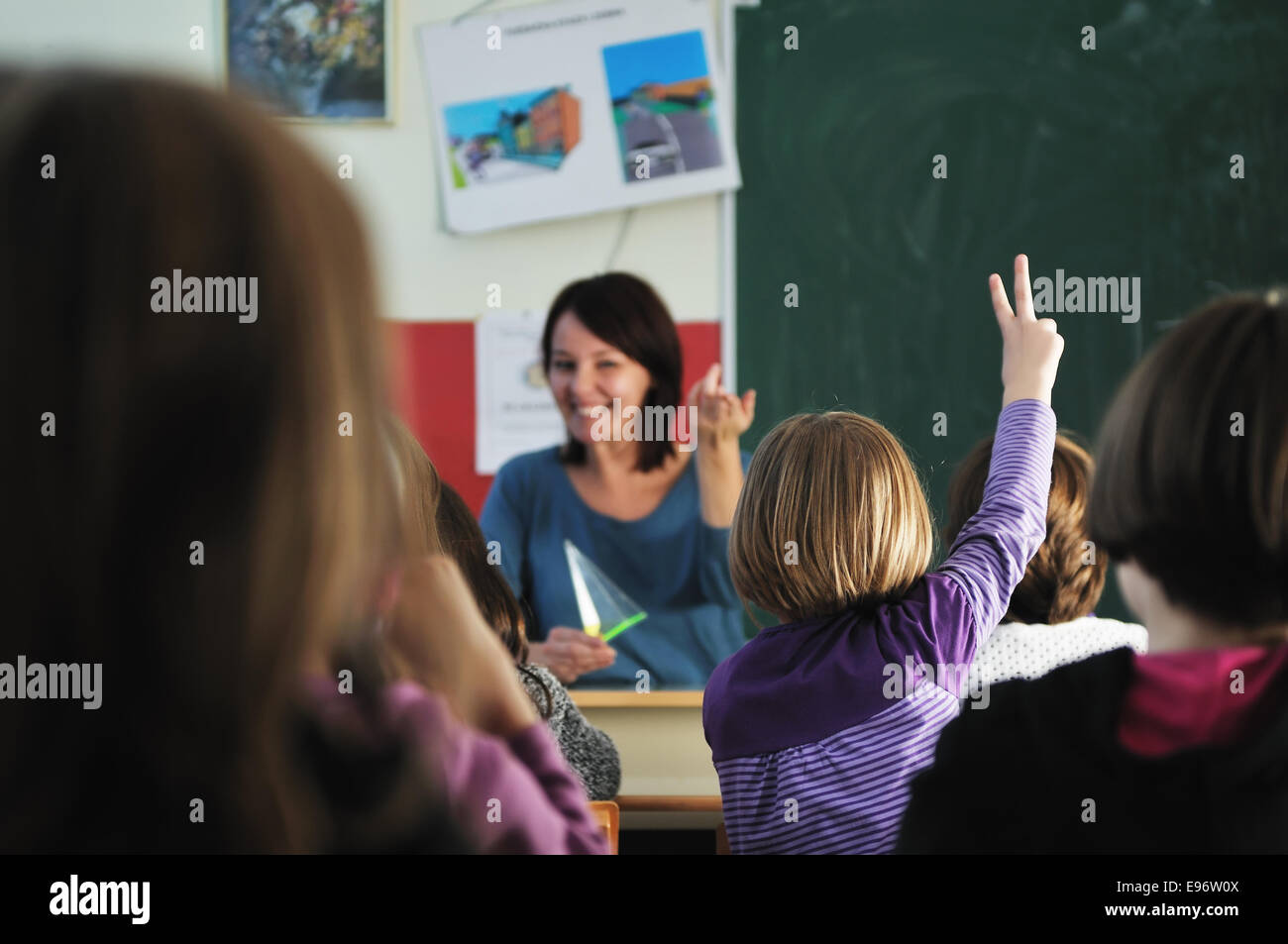 happy teacher in school classroom Stock Photo - Alamy