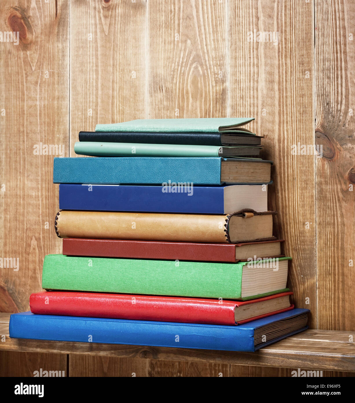 Books on the brown bookshelf Stock Photo