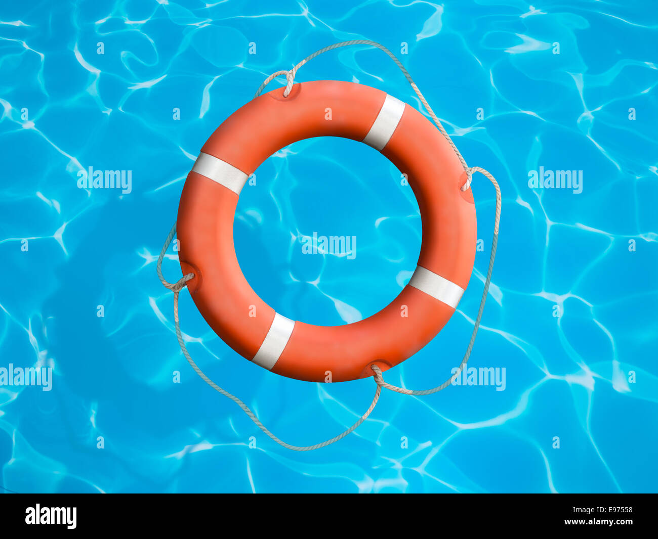 Lifebuoy on blue water surface concept Stock Photo