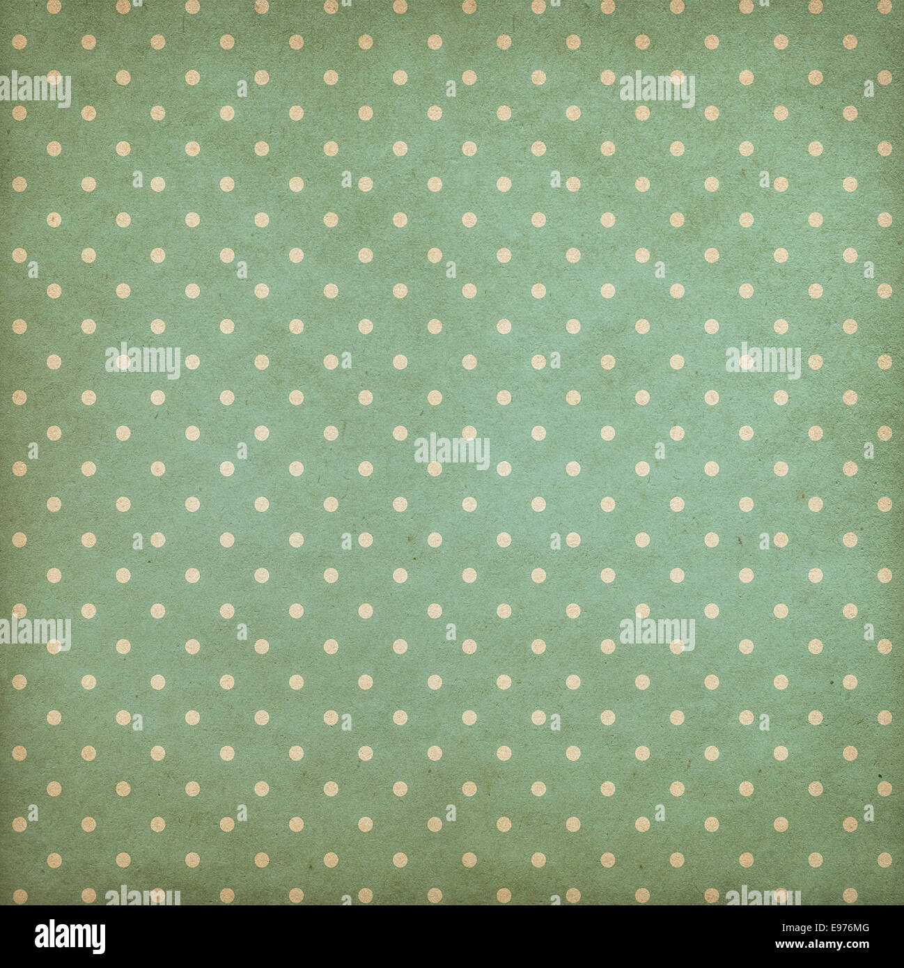 Retro polka dot blue or cyan pattern on old wallpaper Stock Photo