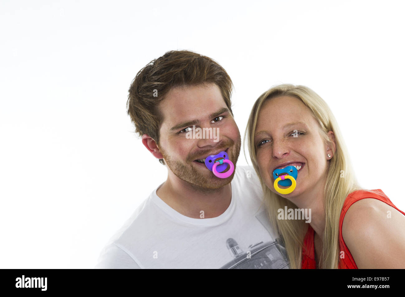 Parents with pacifier in mouth Stock Photo Alamy