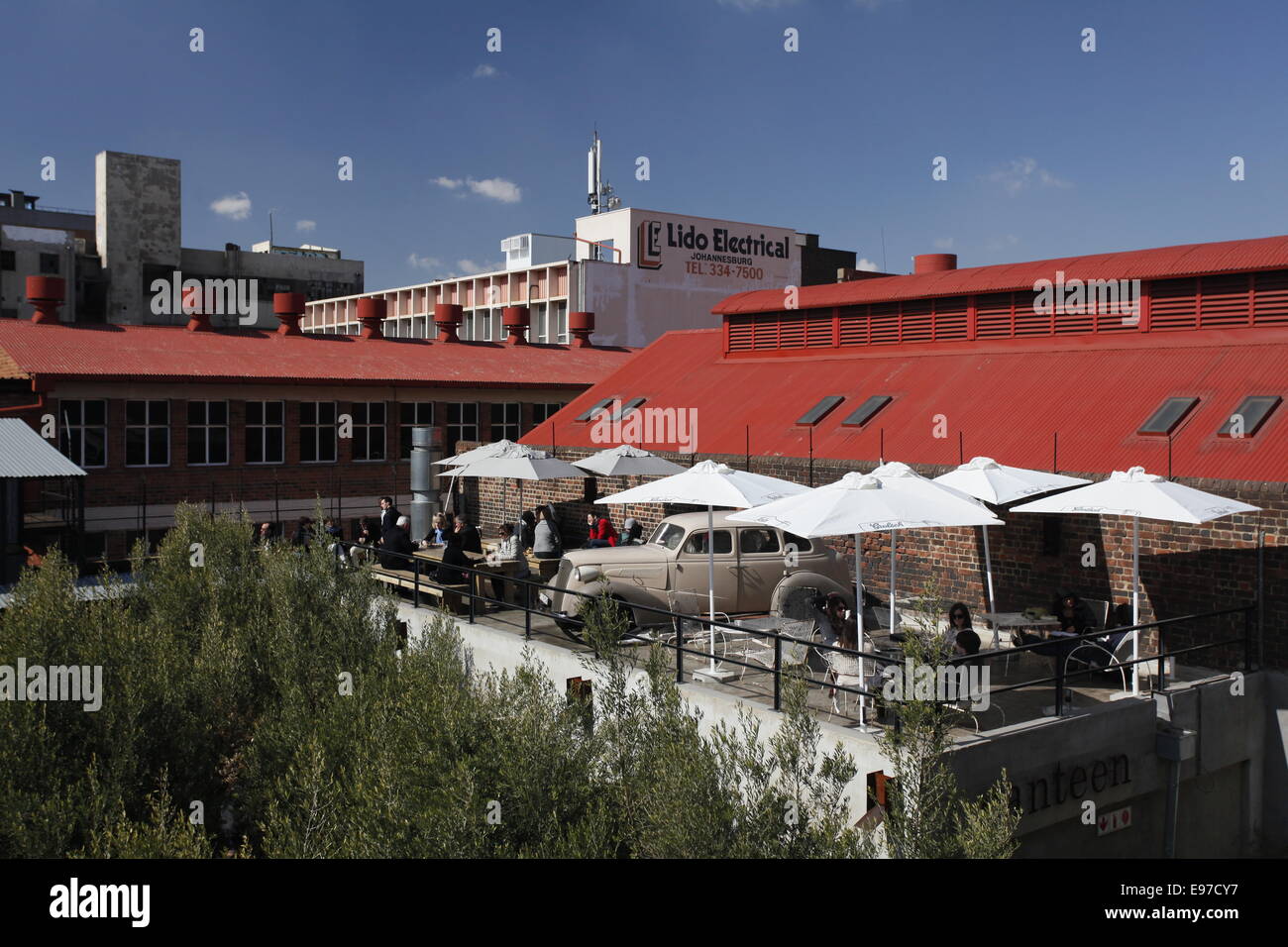A view overlooking the garden at Arts on Main towards Main Street Life. Johannesburg CBD, Gauteng, South Africa Stock Photo