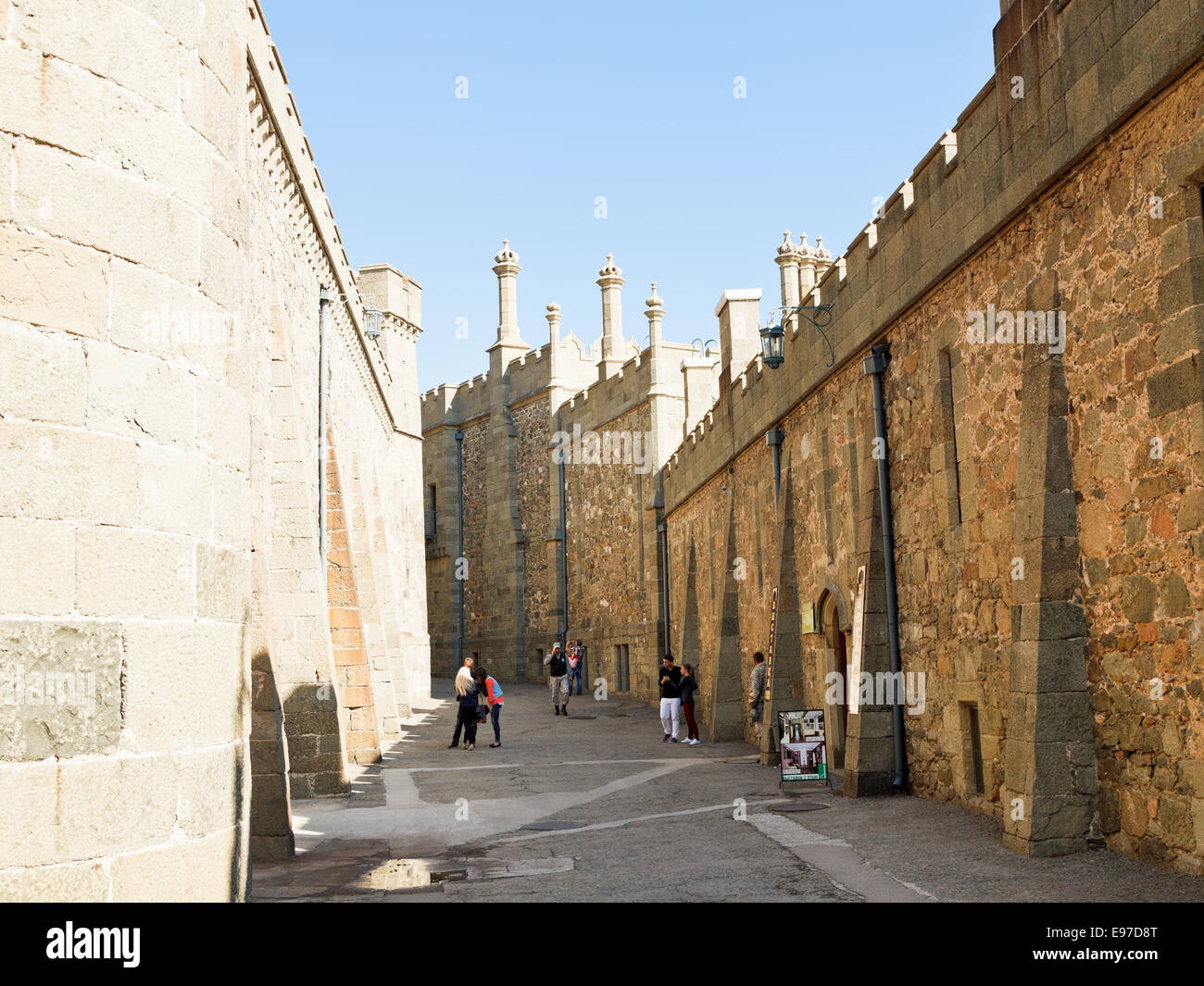 ALUPKA, RUSSIA - SEPTEMBER 28, 2014: tourists in Shuvalov Passage of Vorontsov (Alupka) Palace in Crimea. The palace was built i Stock Photo