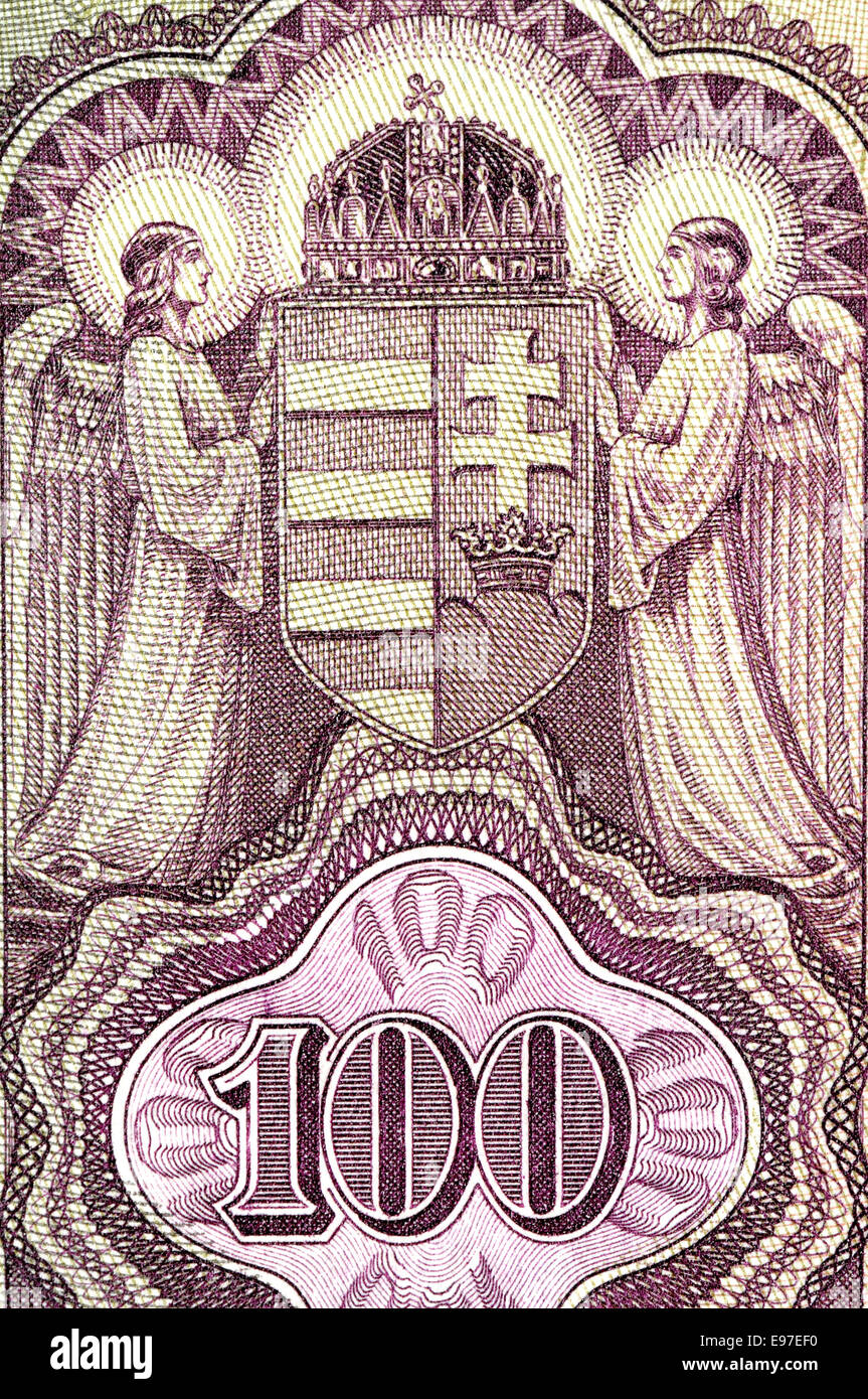 Detail from a 1930 Hungarian 100 Pengo banknote showing two angles holding the Hungarian coat of arms Stock Photo