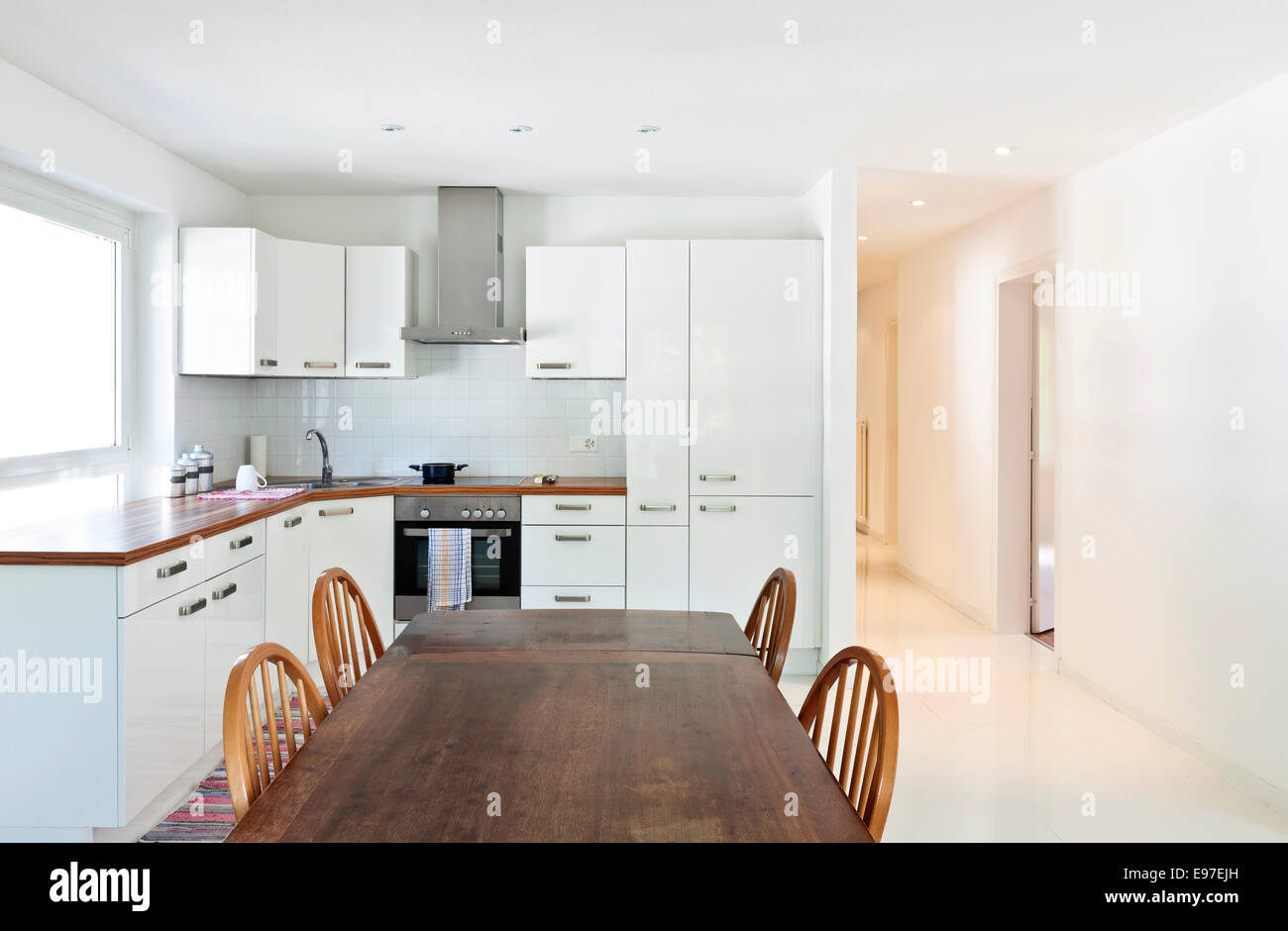 interior house, large modern kitchen, dining table Stock Photo - Alamy