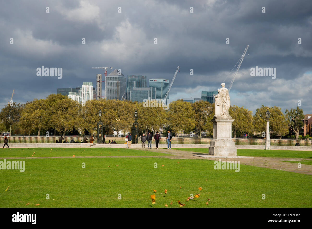 Statue of King George II in the Old Royal Naval College, Greenwich with Canary Wharf, London Docklands in the background Stock Photo