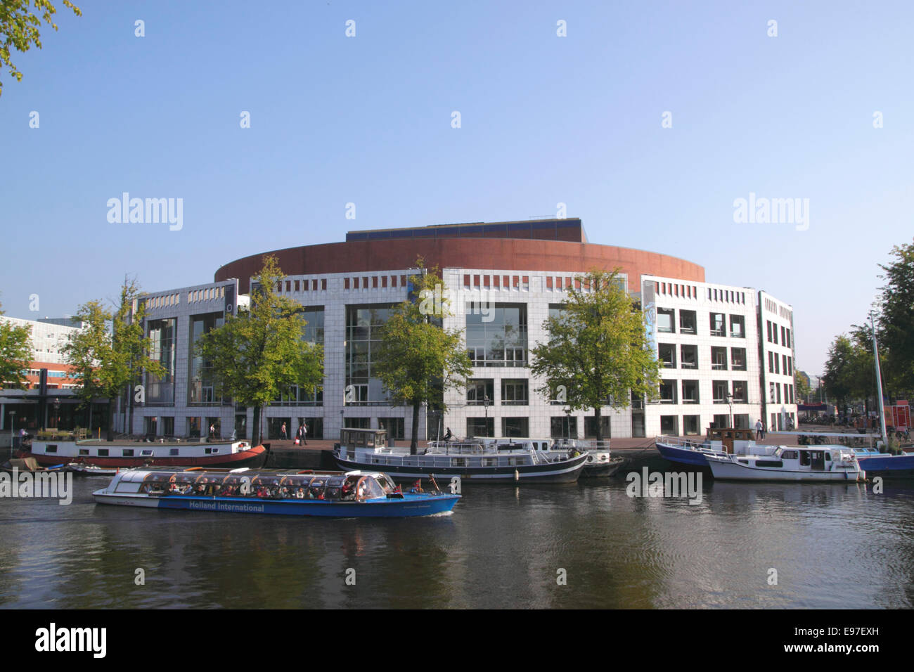 Stadhuis Muziektheatre opera house by Amstel River Amsterdam Stock Photo
