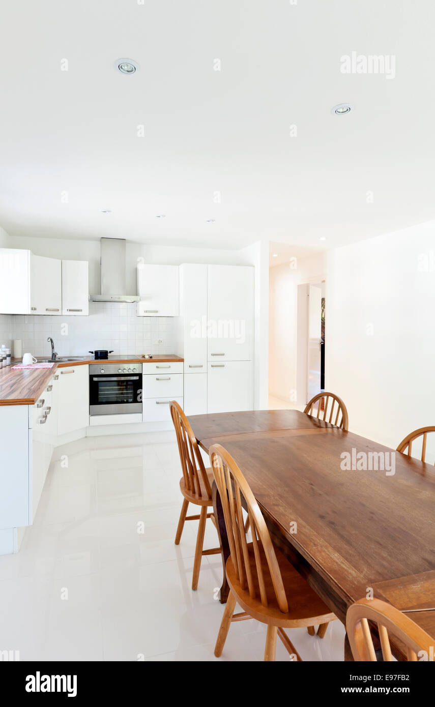 interior house, large modern kitchen, dining table Stock Photo - Alamy