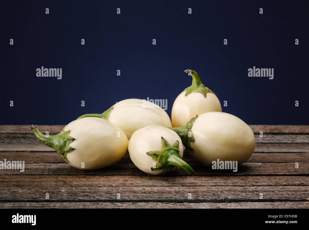 Five white Aubergines, Mini Eggplants Stock Photo