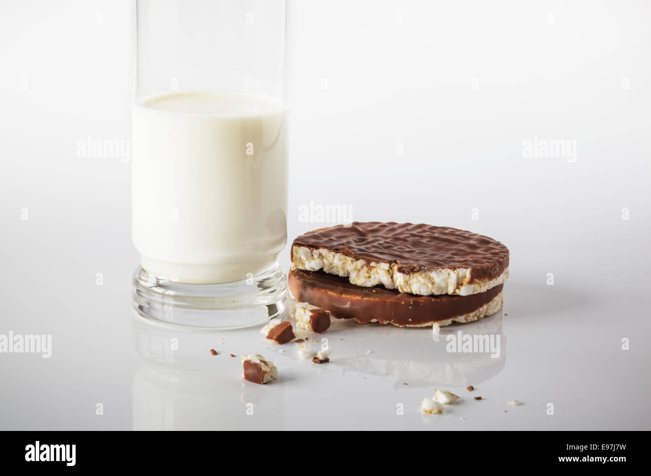 Chocolate covered Rice cakes and a glass of Milk Stock Photo