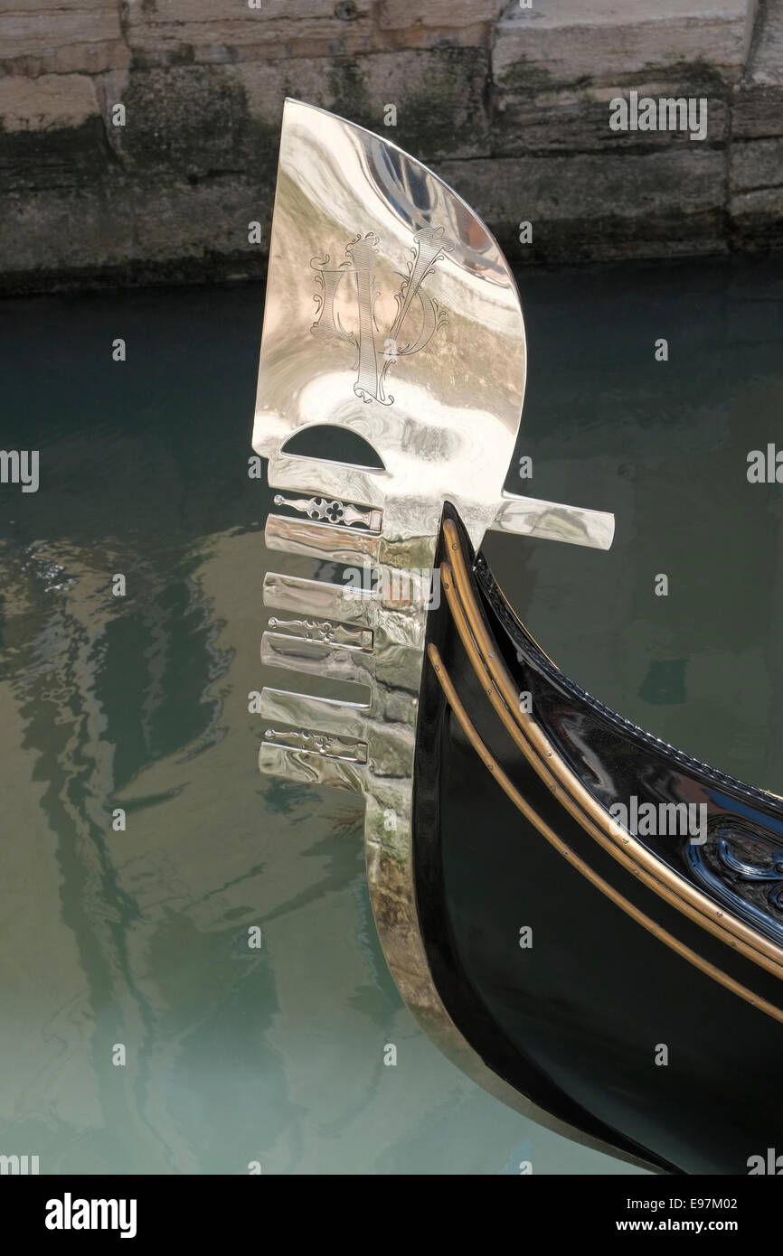 The Ferro (Iron) on the bow of a gondola. San Marco, Venice, Italy. Stock Photo