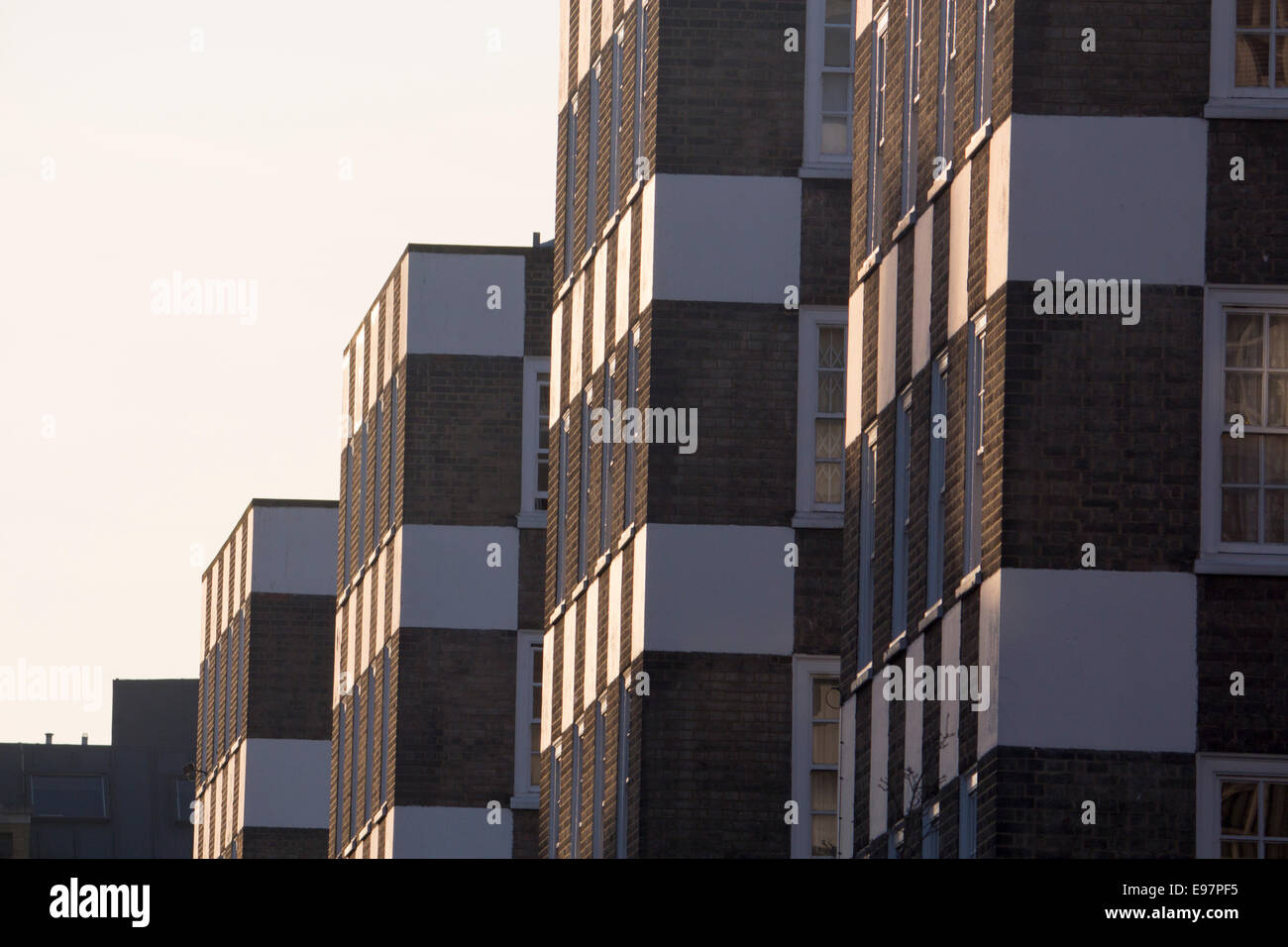 Distinctive tower blocks of flats apartments with checkerboard facade front frontage Grosvenor Estate Page Street Pimlico London Stock Photo