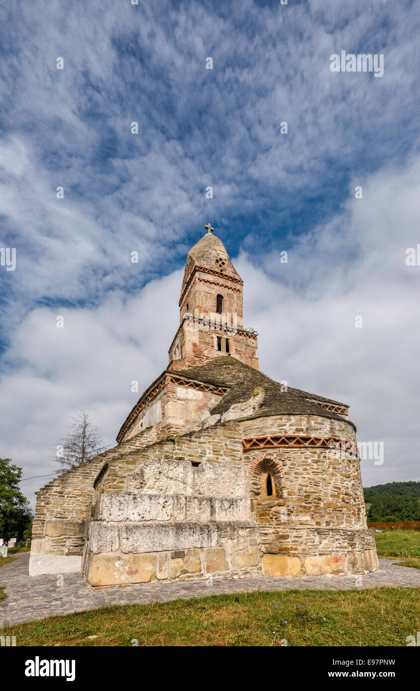 Biserica Sf Nicolae, medieval Orthodox Church of St Nicholas, 7th century, in village of Densus, Transylvania, Romania Stock Photo
