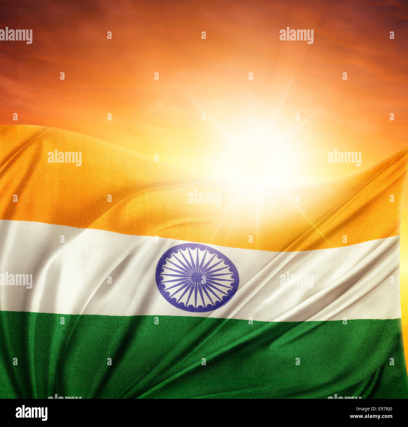 Indian flag in front of bright sky Stock Photo