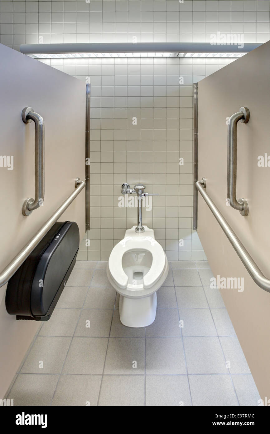 The stall for disabled access in a modern mens's room Stock Photo