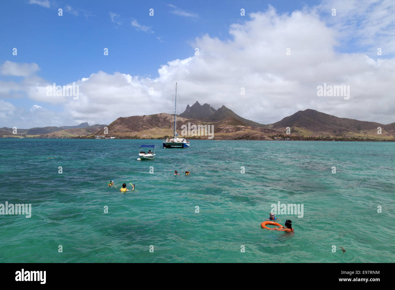 Tourists snorkelling in Mauritius, Indian Ocean, Africa Stock Photo