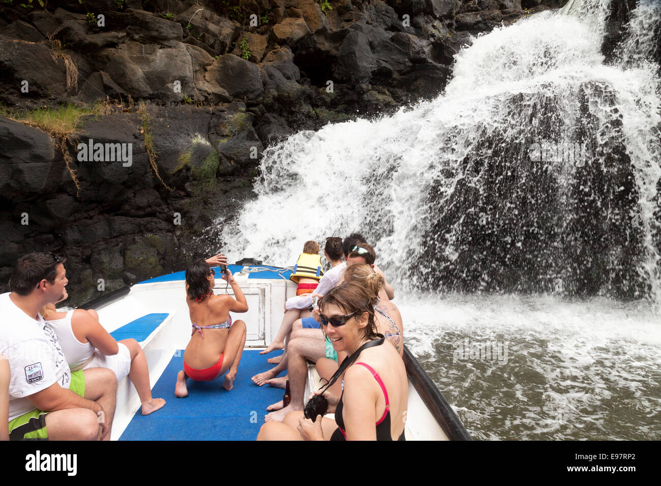 tourists looking at the waterfall at Beau Champ, on the Grande Riviere Sud-Est, longest river on Mauritius Stock Photo