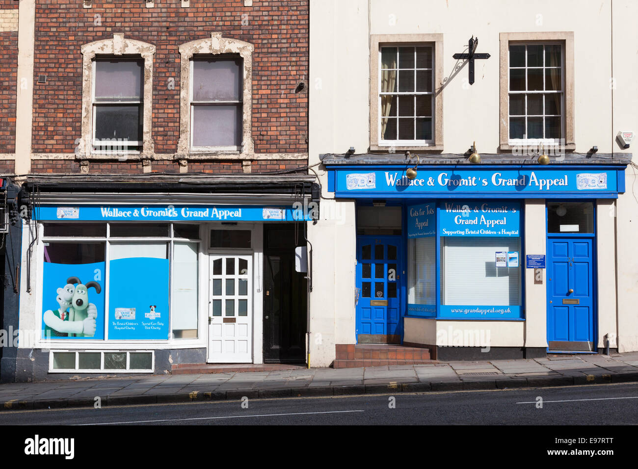 Two shop fronts featuring the children's characters Wallace and Gromit in support of a charity appeal. Stock Photo