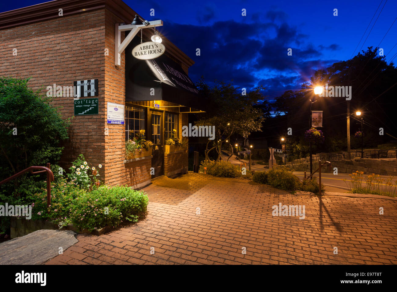 Abbey's Bake House along Maple Street in downtown Port Carling at dusk. Ontario, Canada. Stock Photo