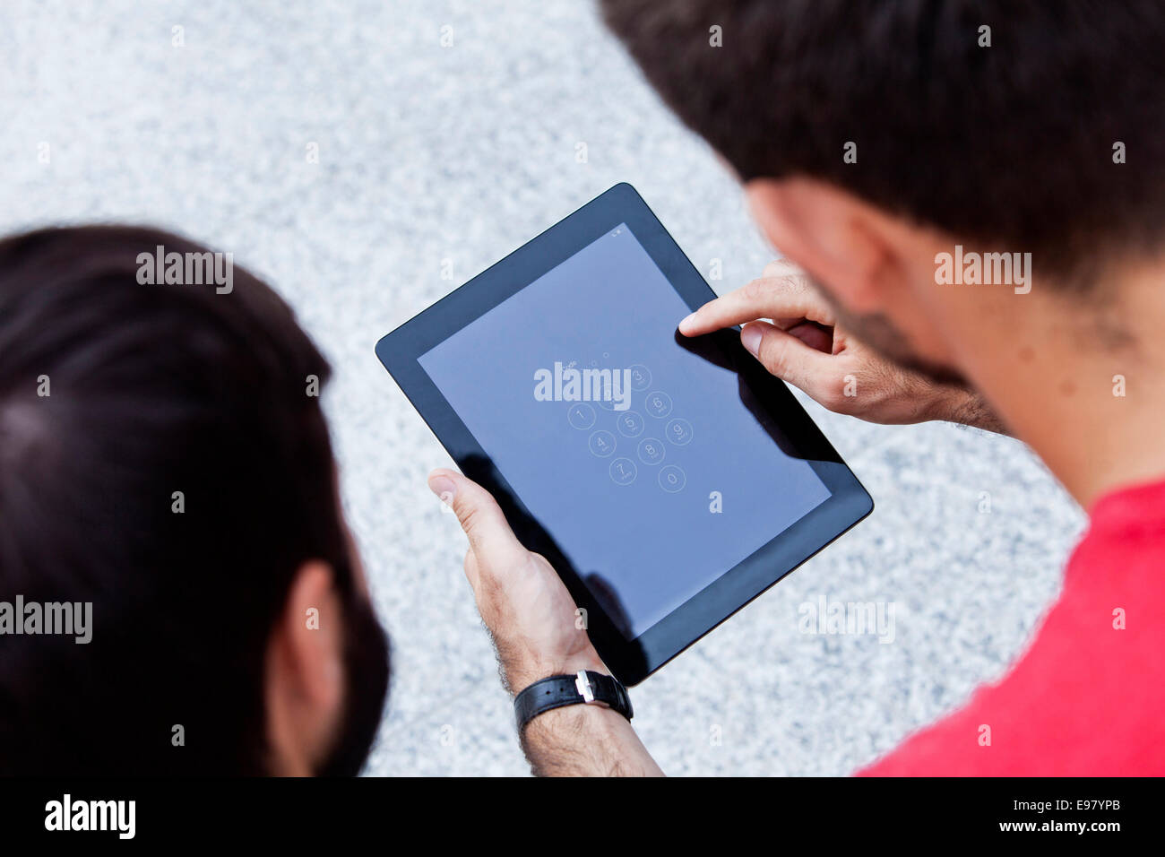 Using digital tablet with touchscreen Stock Photo - Alamy