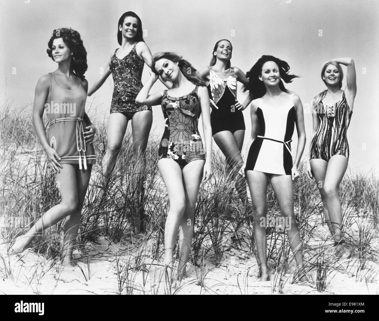 London, UK, UK. 11th Sep, 1965. Date unknown - Models in one piece bathing suits stand on a beach Fashion show for beachwear. © KEYSTONE Pictures/ZUMA Wire/ZUMAPRESS.com/Alamy Live News Stock Photo