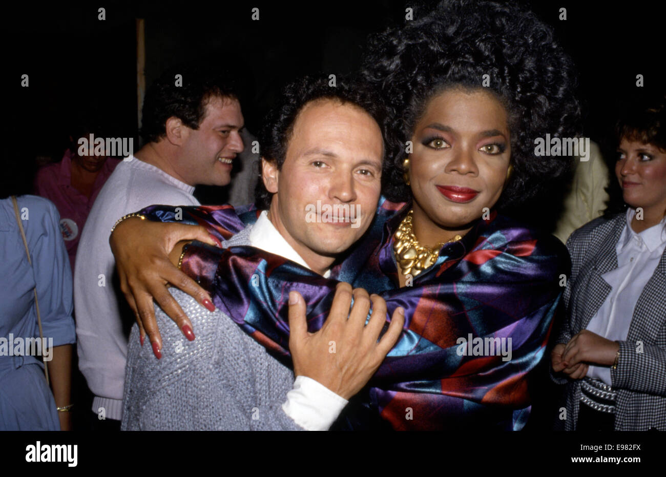 Billy Crystal and Oprah Winfrey at event promoting the first Comic Relief benefit circa 1986 Stock Photo