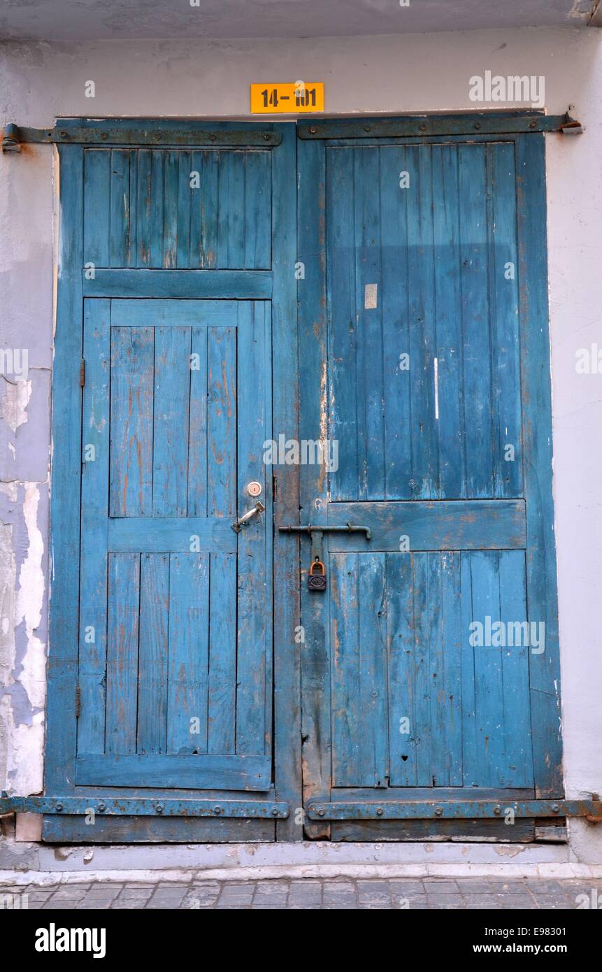Blue wooden weathered door with padlock Stock Photo - Alamy