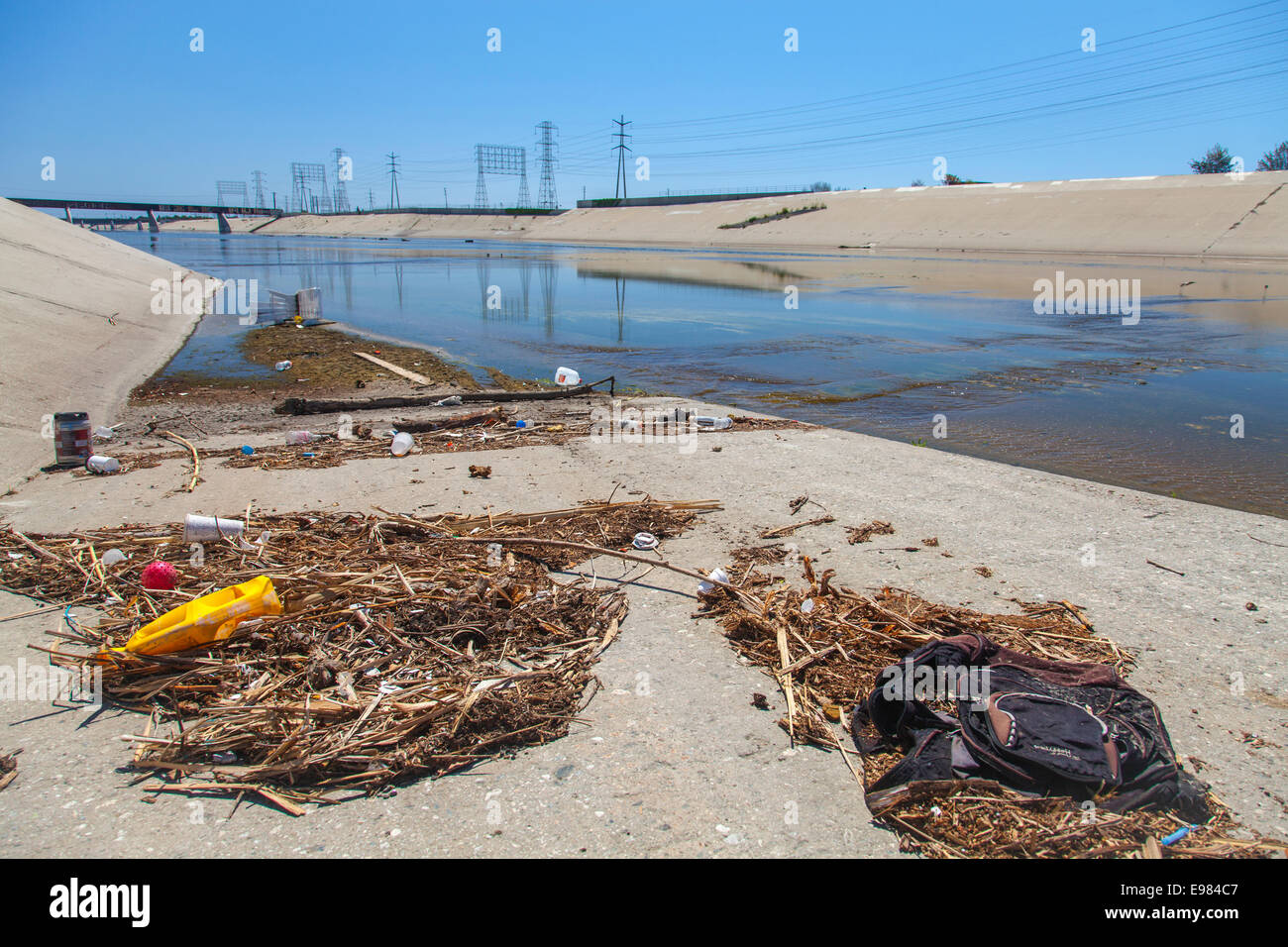 Trash along the banks of Los Angeles River, Long Beach, California, USA