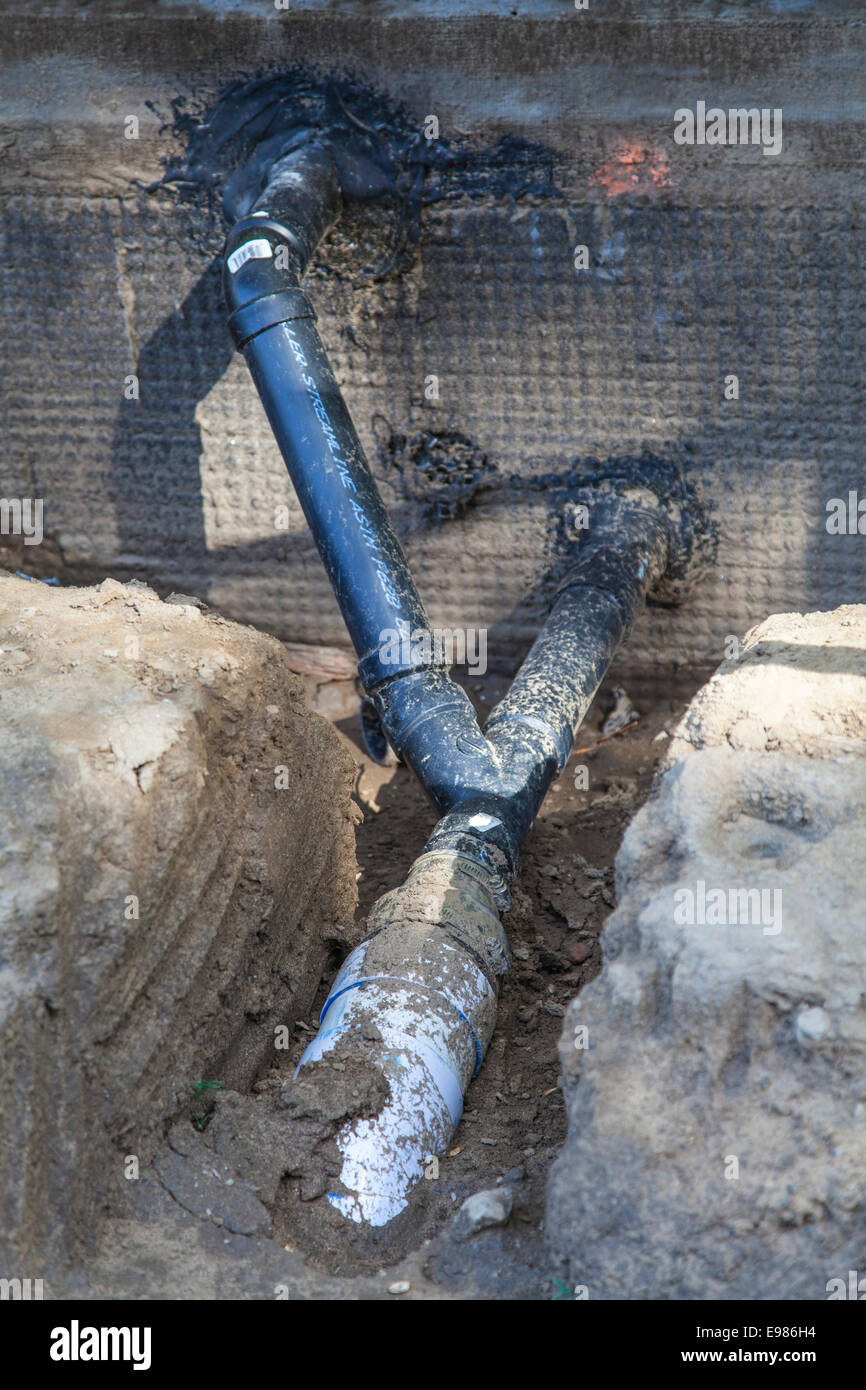 Poly Vinyl Chloride (PVC) Pipes being installed for rainwater