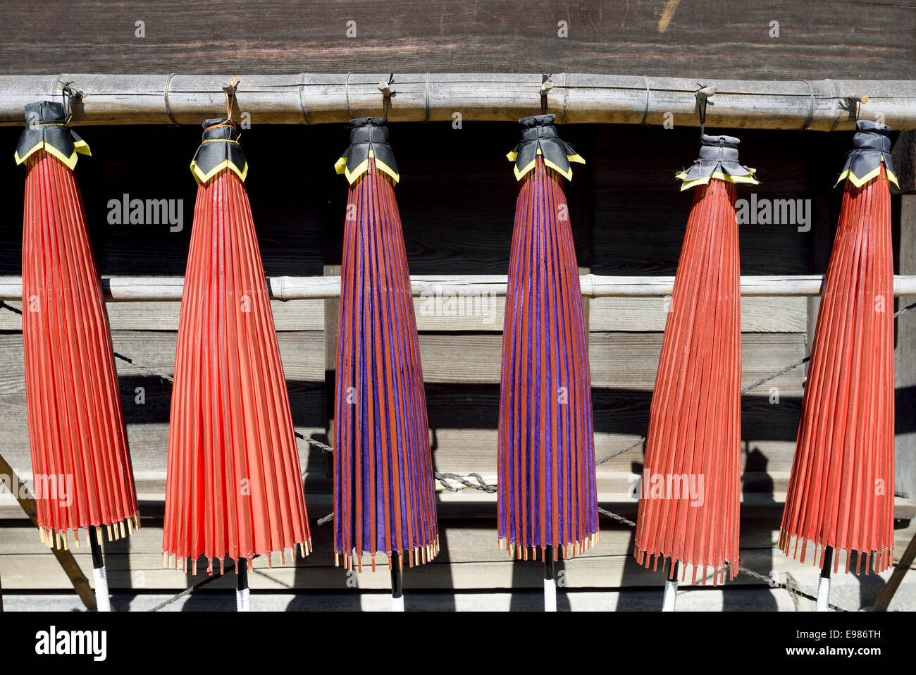 Closed Japanese traditional red umbrella Stock Photo - Alamy