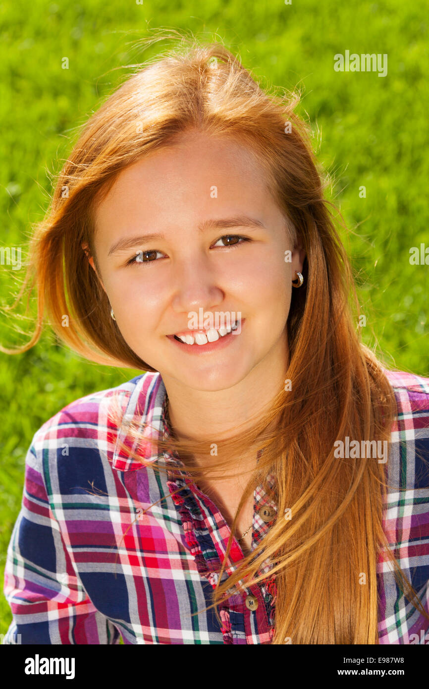 Portrait of young happy girl with long hair Stock Photo - Alamy