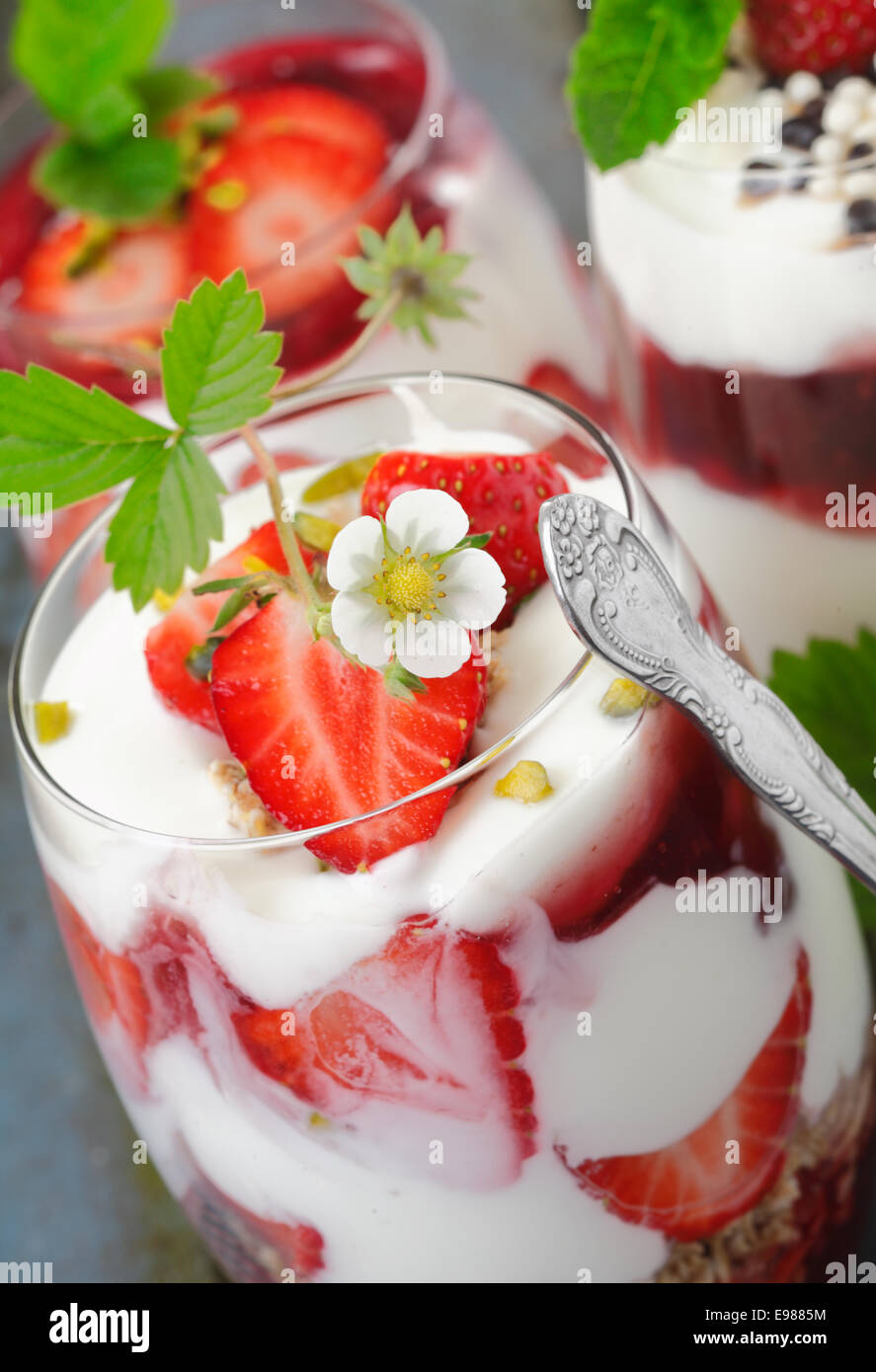 Assorted Strawberry Dessert closeup with flowering topping Stock Photo
